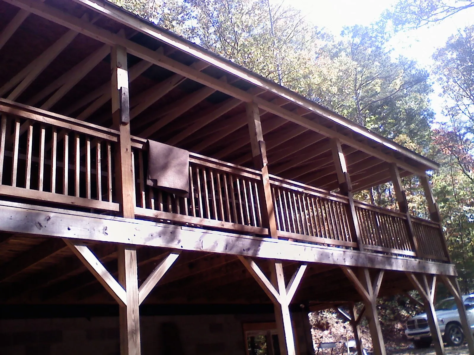 Timber framing under a new elevated porch and deck — Roof Leak Repair in Poneto by Roofing Brothers
